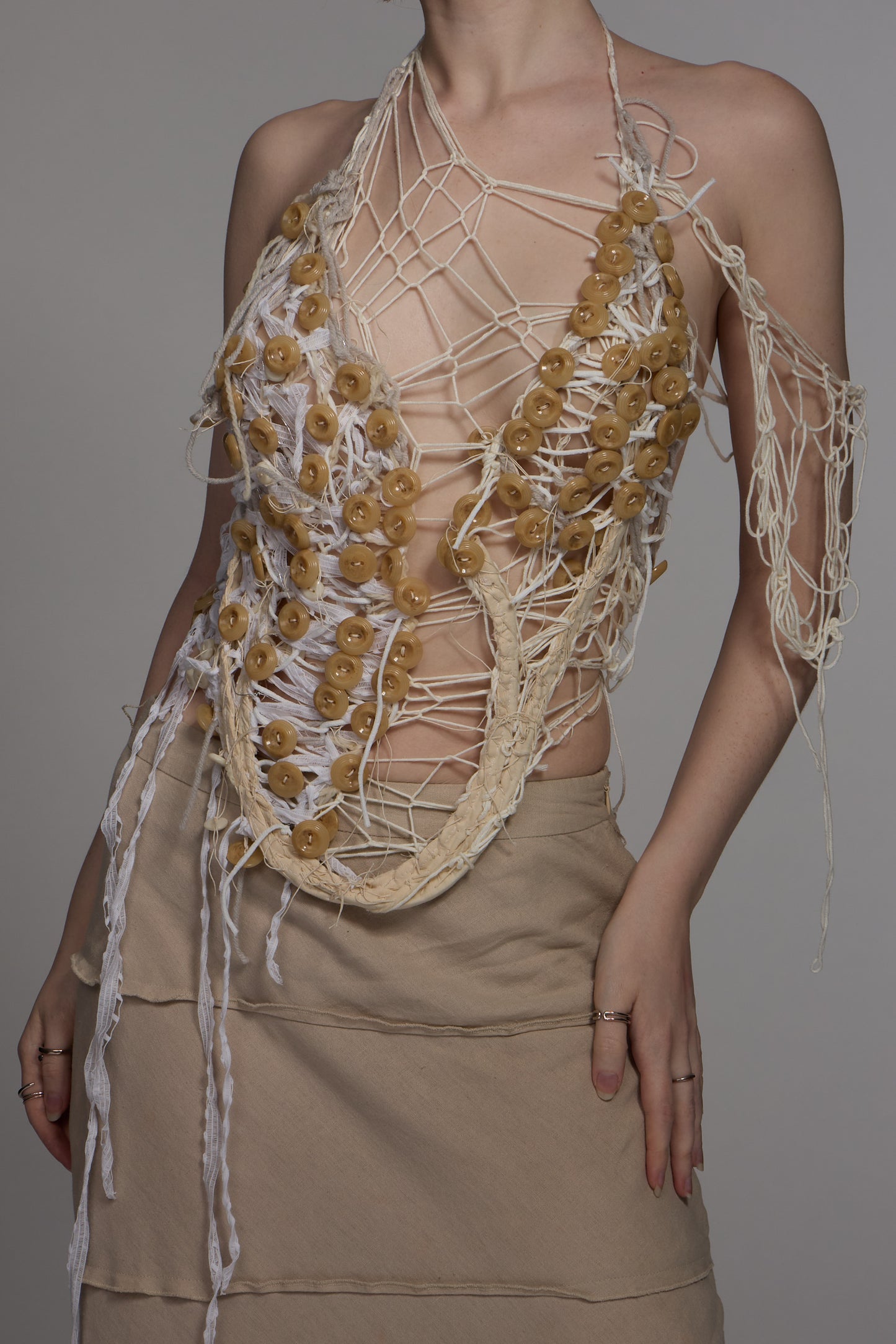 Yarn and buttons corset